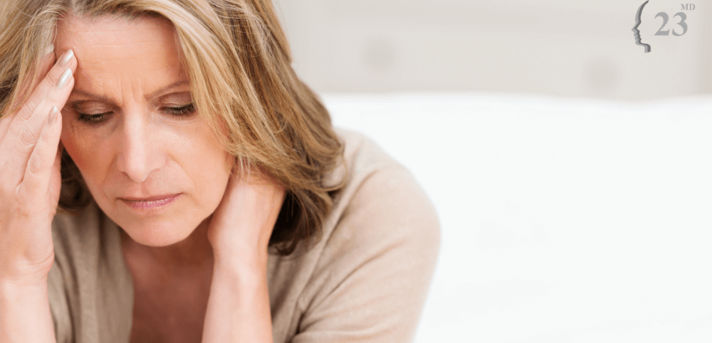 woman concerned about signs of early menopause